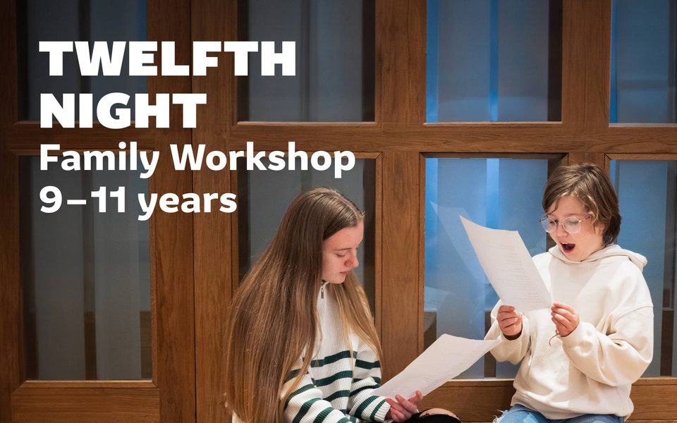 Two young people reading from scripts during a family drama workshop.
