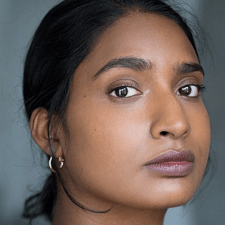 An actor looking into the camera.